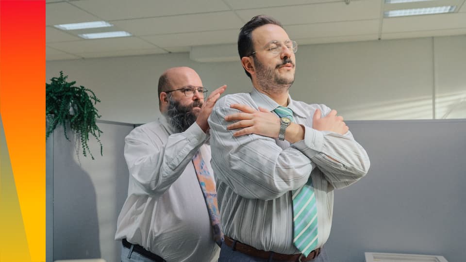 Two men doing a trust fall