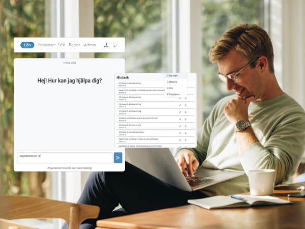 Man med laptop och SD Worx Lön-AI